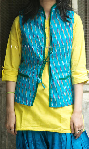 Light blue ikat & green jacket